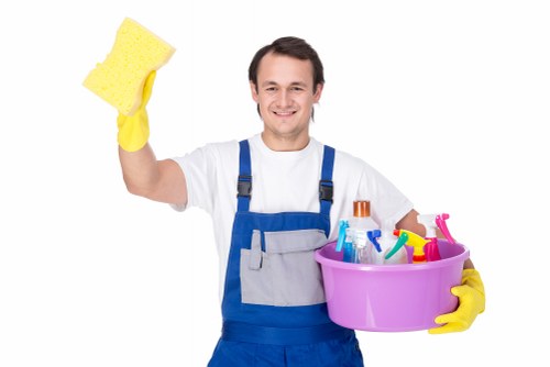 Professional Harlington carpet cleaners refreshing a living room carpet